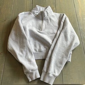 Grey TNA cropped sweater